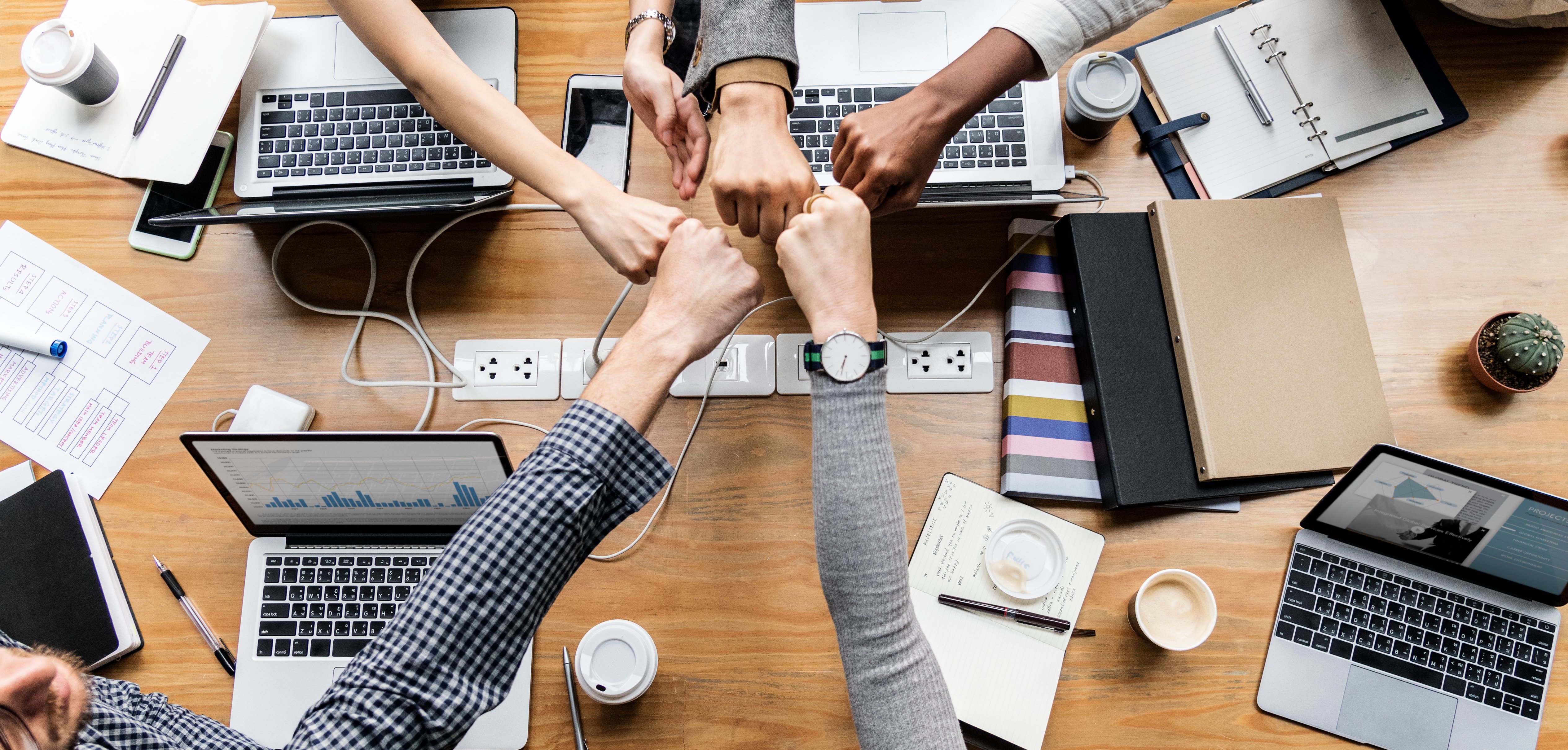 colleagues-giving-fist-bump (1)