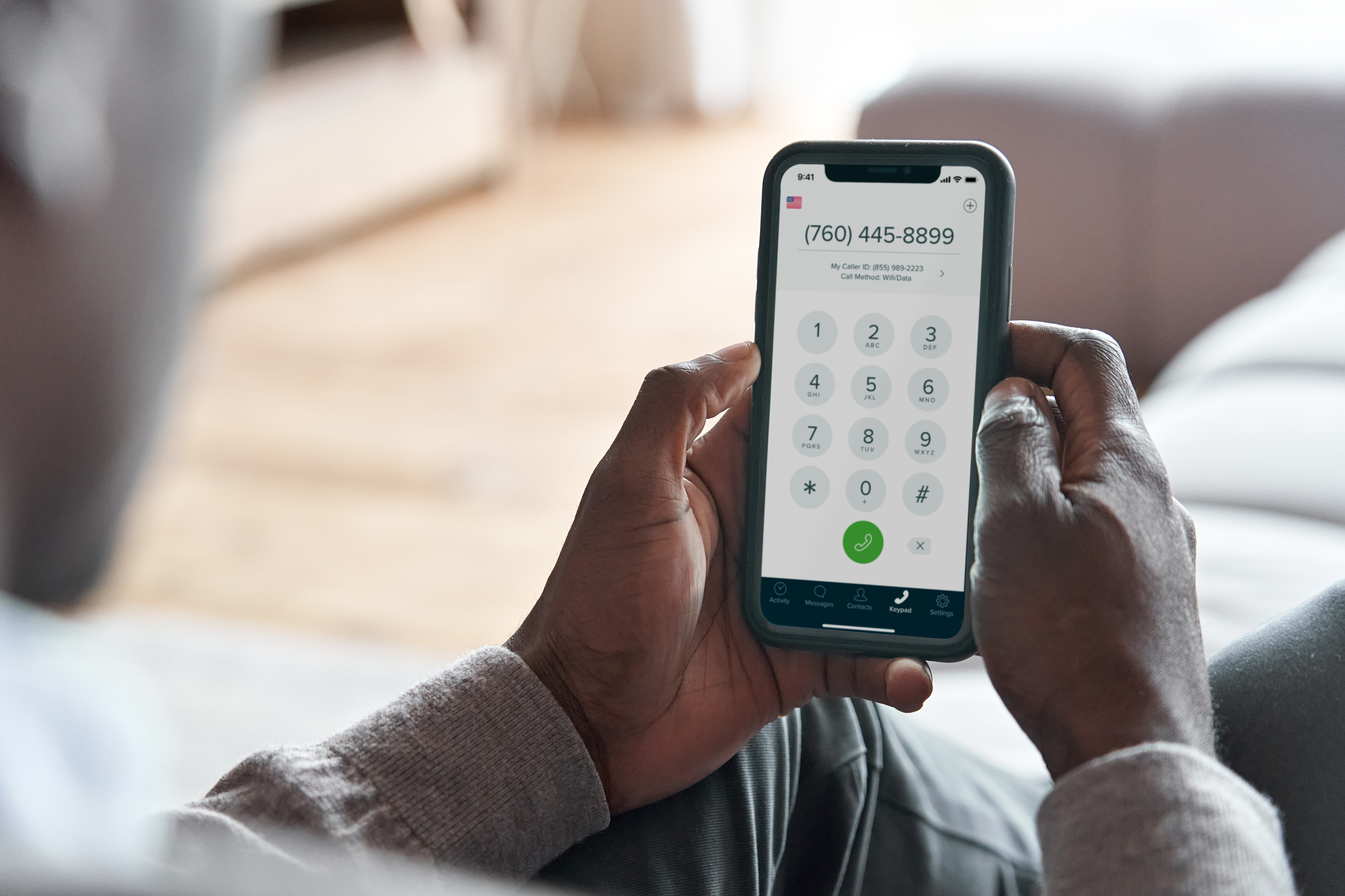 african american holding phone_dial